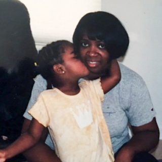 Jada as a child with her mom, Melina.