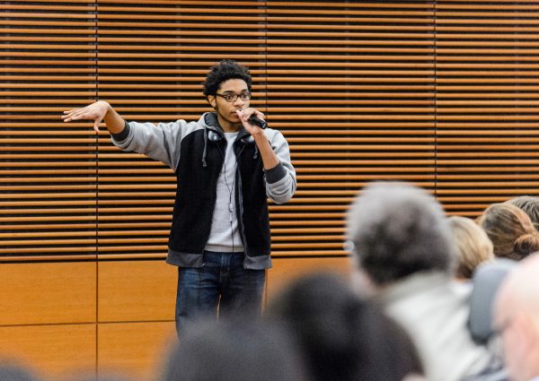 UW student Deshawn McKinney speaks during a public roundtable discussion titled 